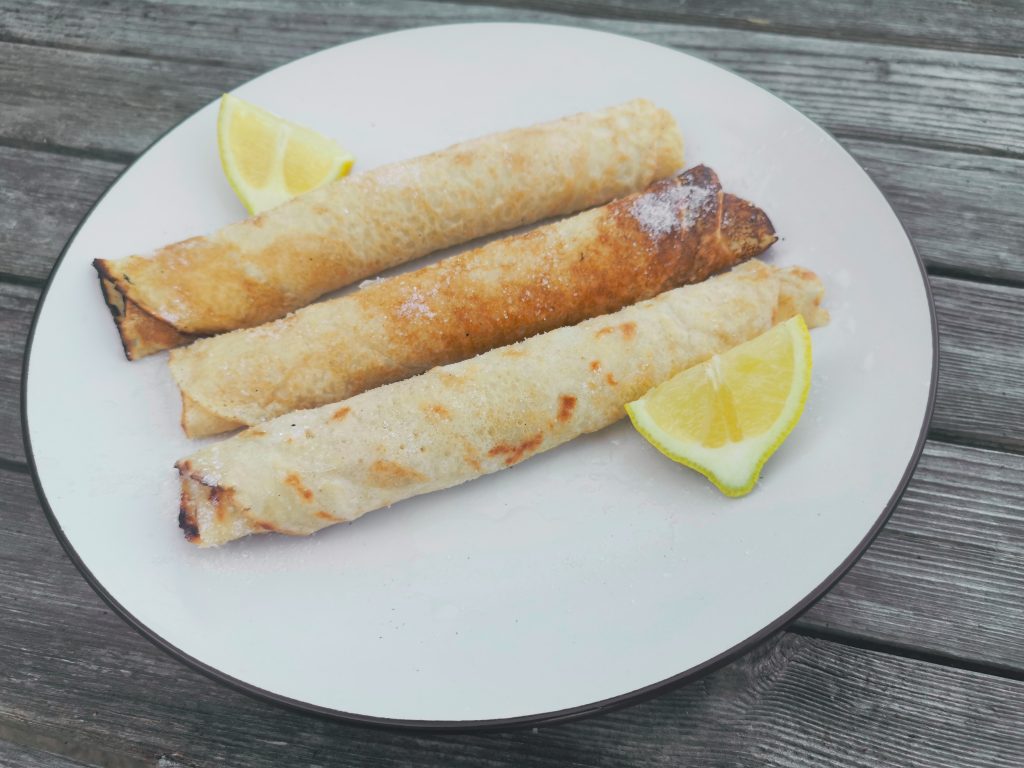 British vegan pancakes on plate with lemon